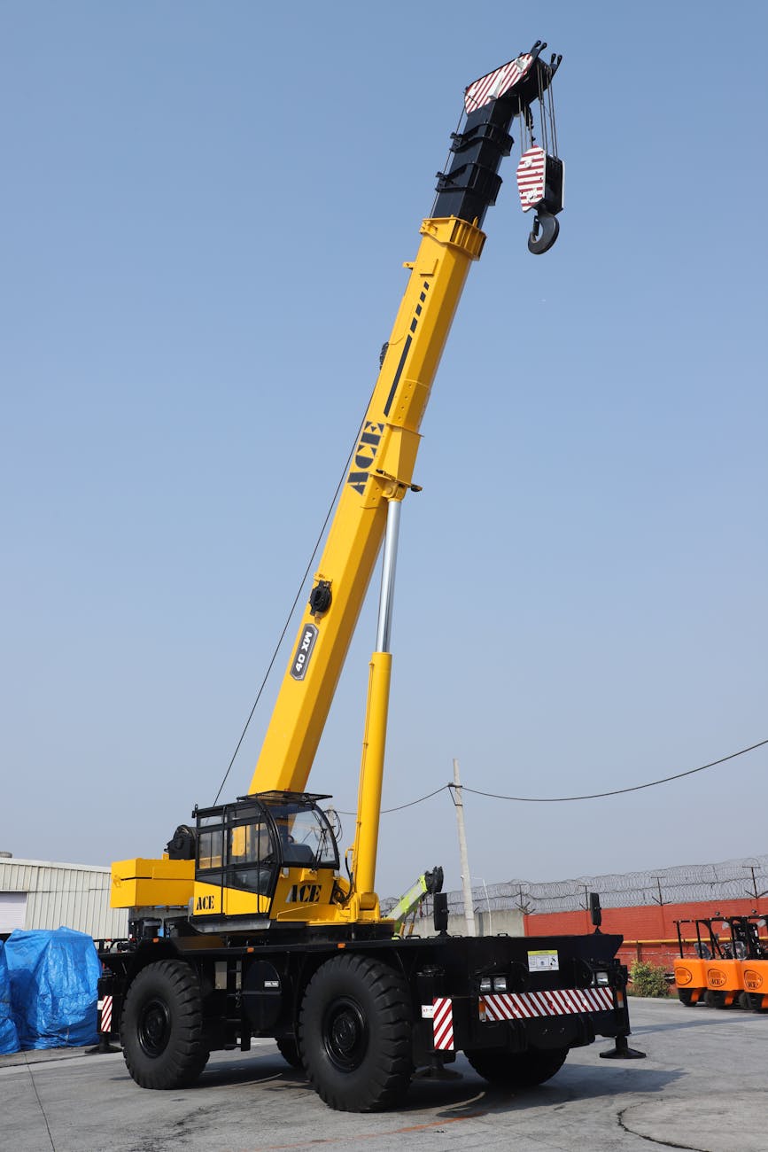 yellow rough terrain crane in faridabad yard